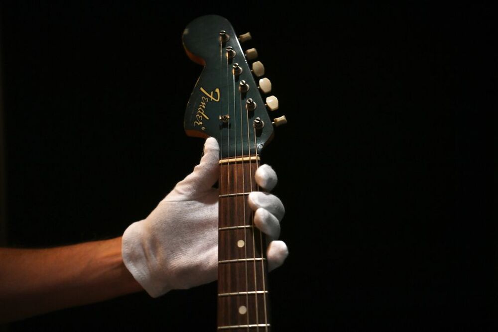 Kurt Cobain Guitar Auction  / NEIL HALL