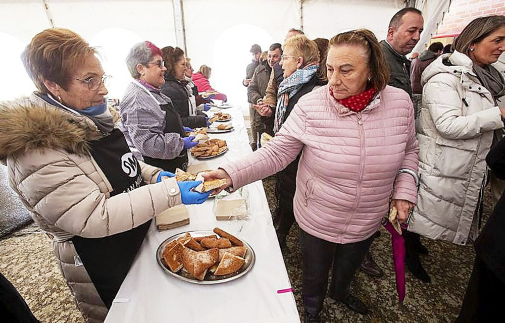 Tradición en torno a 140 k de cerdo y torta de chicharrón